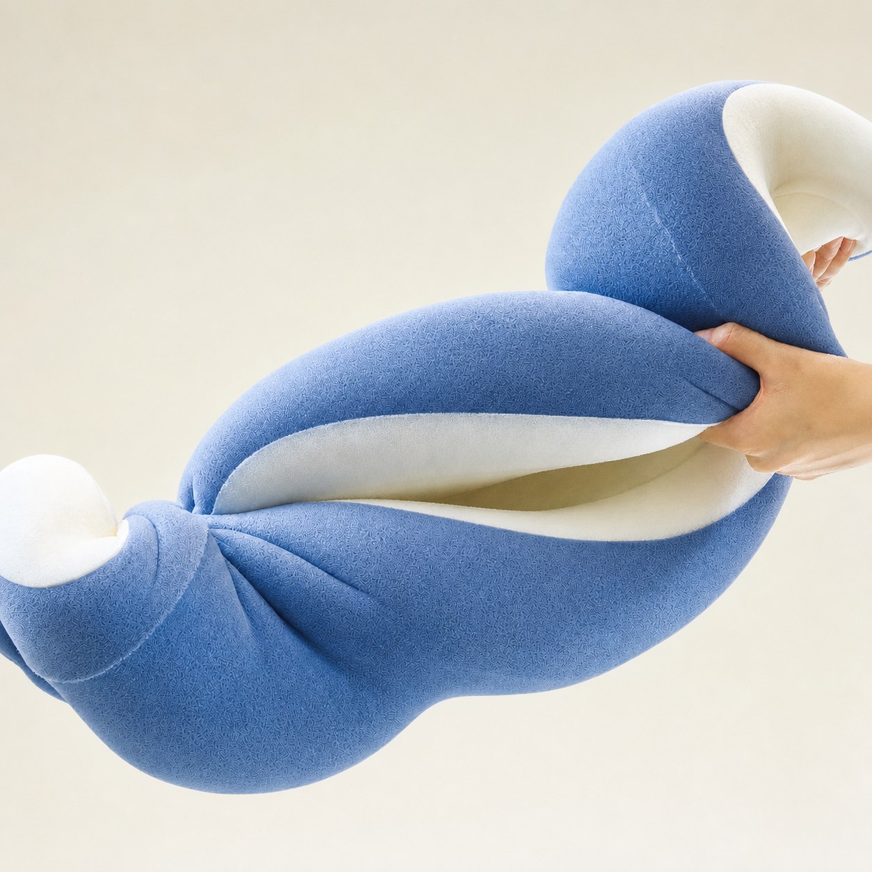 Flexible dual-layer memory foam pillow bending demonstration